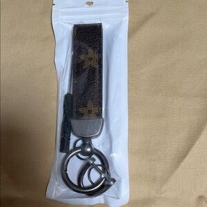 Brown Floral Keychain with Silver Accents